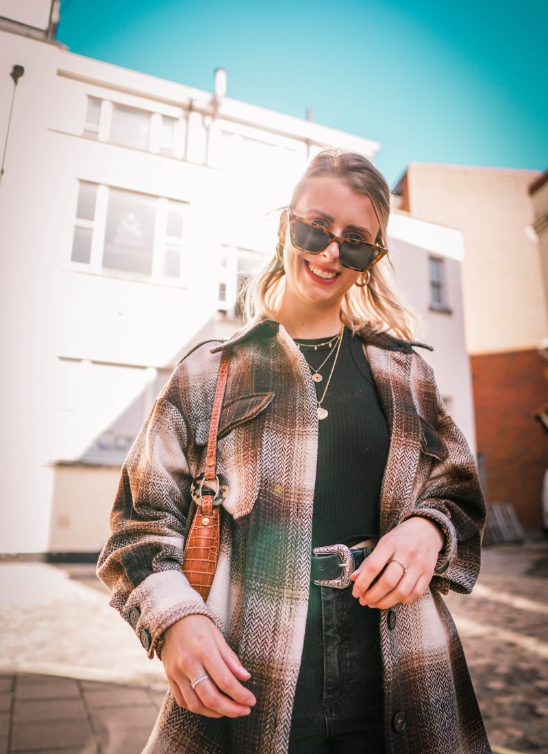 lucy wearing H&M herringbone jacket